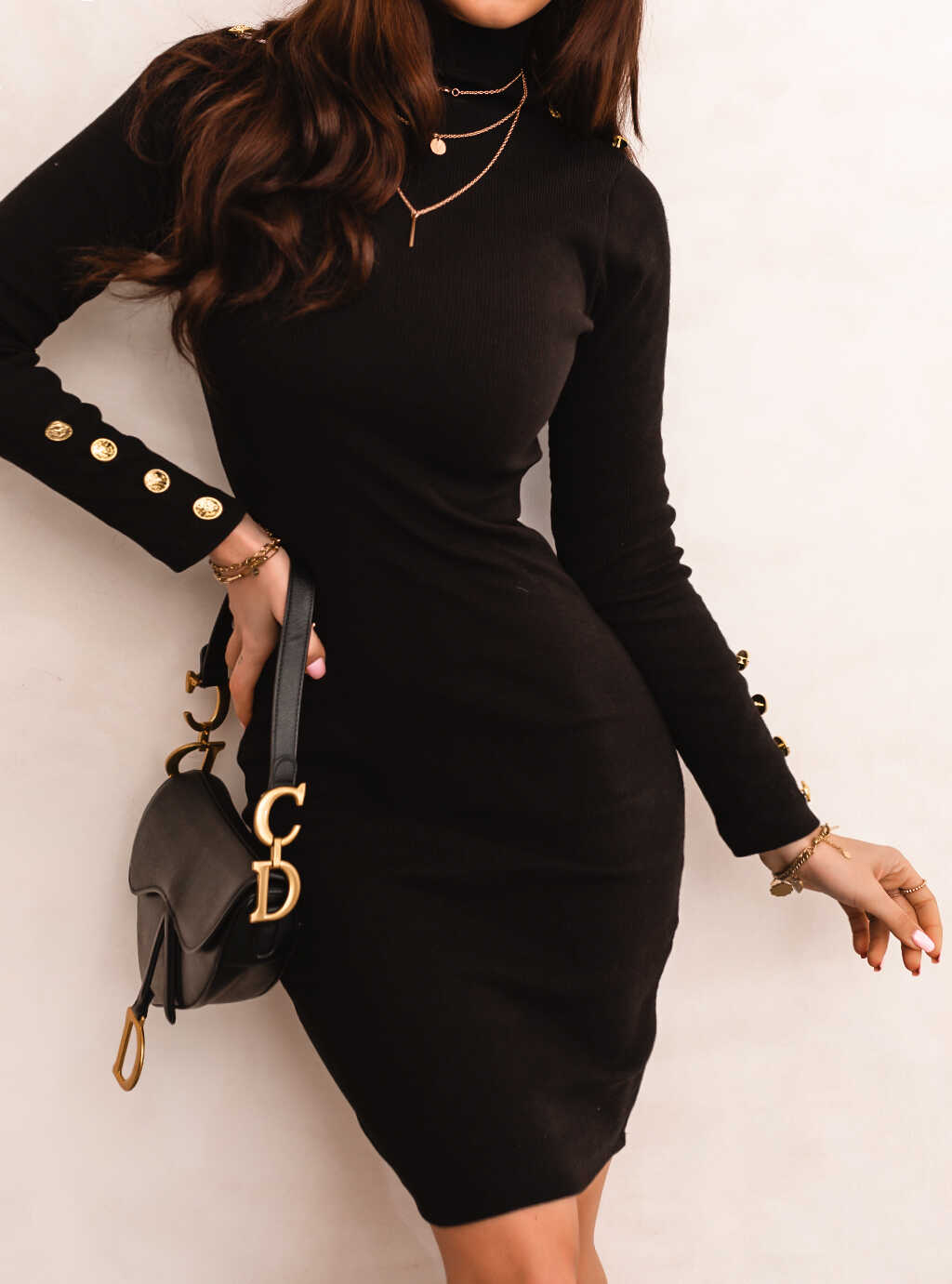 Дамска рокля LORA  https://bvseductive.com/products/womans-s-dresses-lora  черна рокля в миди дължина изработена от мека материя в изчистен дизайн вталена кройка, подчертаваща извивките на тялото интересно предложение за ежедневието .